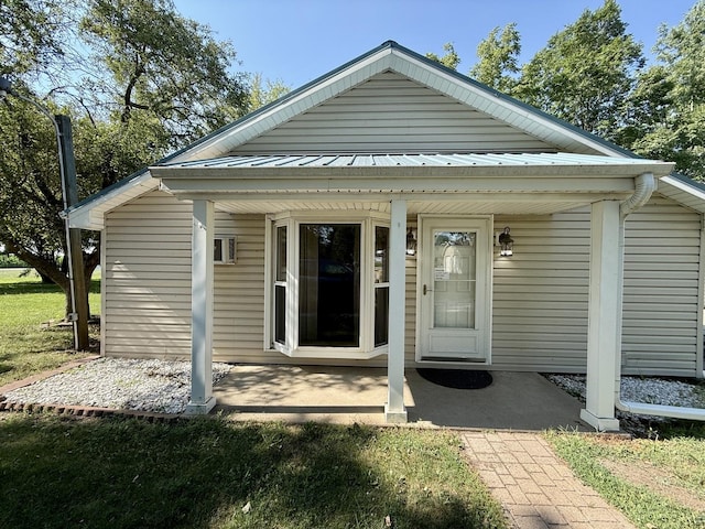 214 S Rising Rd, Champaign, IL 61822 - rear view of house with a porch