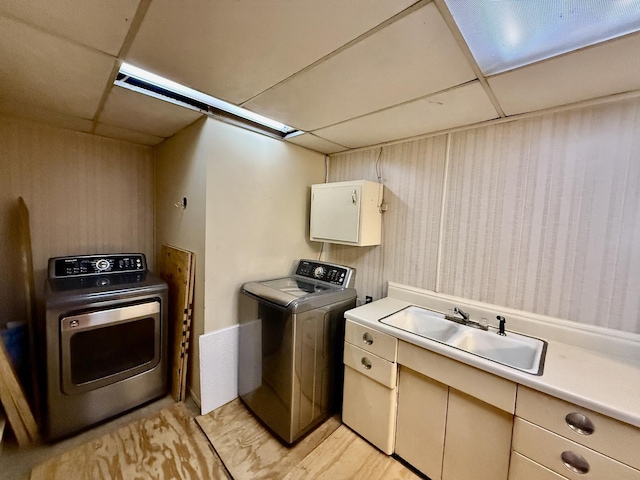 214 S Rising Rd, Champaign, IL 61822 - laundry room featuring cabinet space and washing machine and clothes dryer