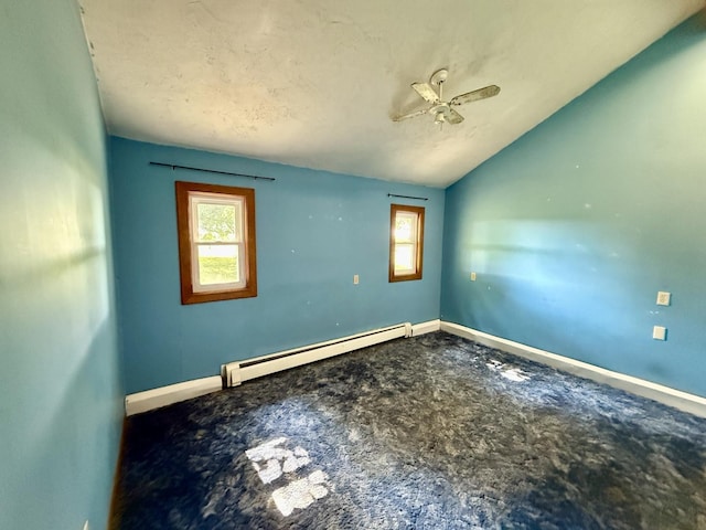 214 S Rising Rd, Champaign, IL 61822 - unfurnished room featuring a baseboard heating unit, a ceiling fan, and lofted ceiling