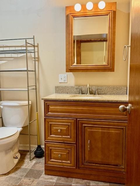 214 S Rising Rd, Champaign, IL 61822 - half bath featuring vanity and toilet