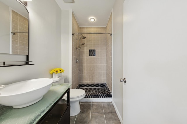 519 S Maplewood Ave Unit 4S, Chicago, IL 60612 - bathroom featuring a tile shower, vanity, and tile patterned flooring