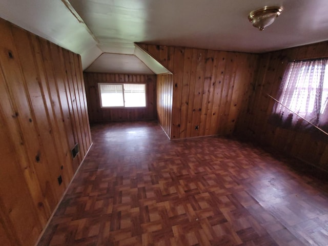 2221 Home Ave, Berwyn, IL 60402 - empty room featuring wood walls and vaulted ceiling
