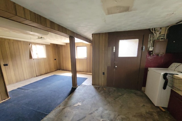 2221 Home Ave, Berwyn, IL 60402 - basement with electric panel, wooden walls, and washer and clothes dryer