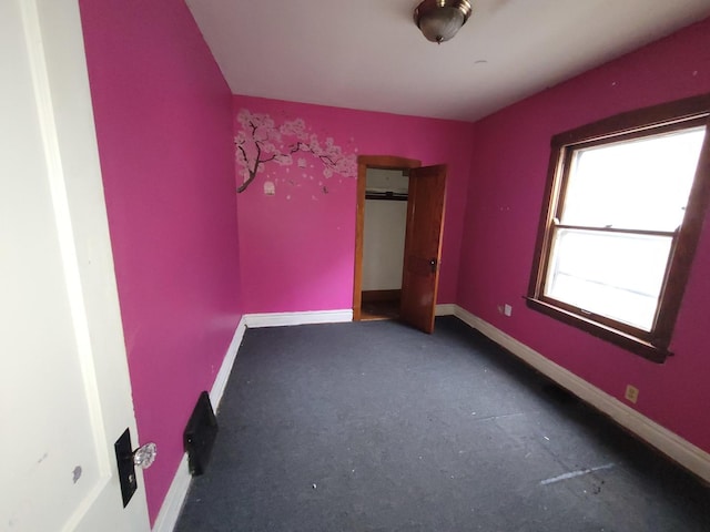 2221 Home Ave, Berwyn, IL 60402 - unfurnished bedroom with carpet flooring and baseboards