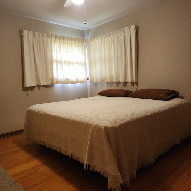 5549 W 83rd Pl, Burbank, IL 60459 - bedroom featuring wood finished floors and ceiling fan