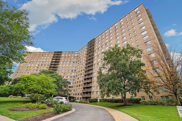 7033 N Kedzie Ave Unit 911, Chicago, IL 60645 - view of apartment building / complex