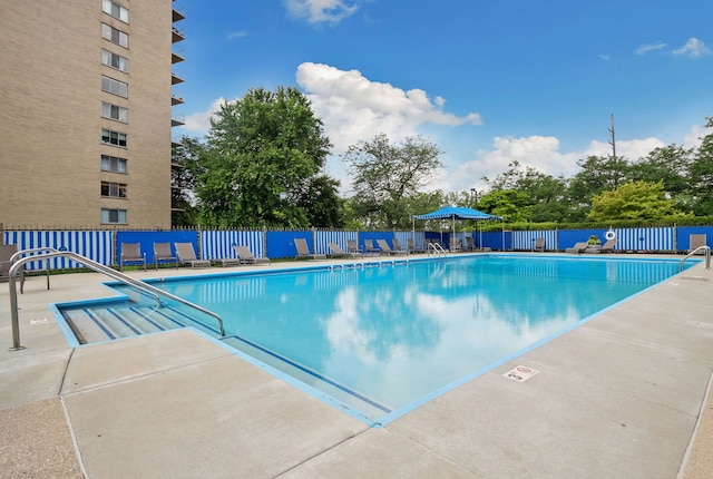 7033 N Kedzie Ave Unit 911, Chicago, IL 60645 - community pool with a patio area