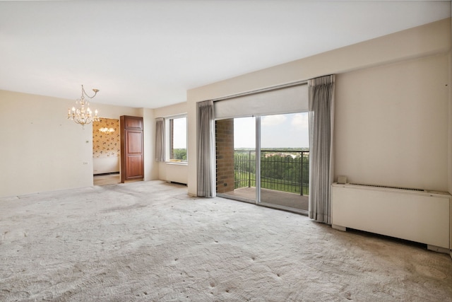 7033 N Kedzie Ave Unit 911, Chicago, IL 60645 - unfurnished room with a chandelier and carpet floors