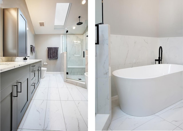 1915 N Albany Ave, Chicago, IL 60647 - bathroom with marble finish floors, double vanity, a marble finish shower, and a soaking tub
