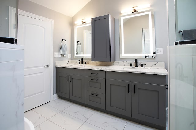 1915 N Albany Ave, Chicago, IL 60647 - bathroom with lofted ceiling, marble finish floors, and double vanity