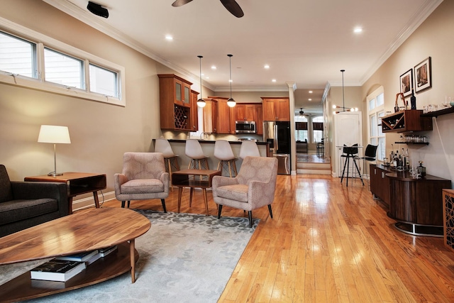 1915 N Albany Ave, Chicago, IL 60647 - living area featuring ceiling fan, light wood-type flooring, recessed lighting, and crown molding