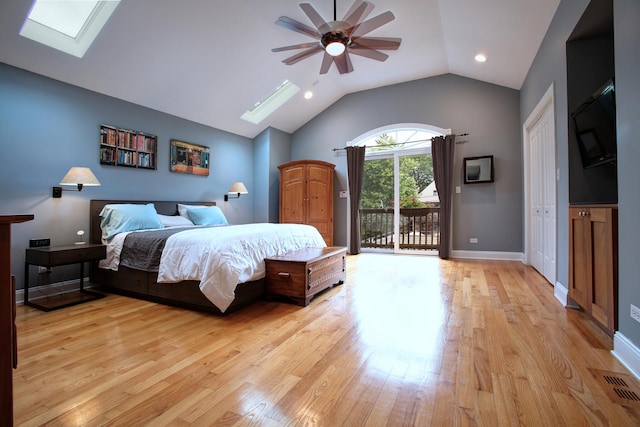 1915 N Albany Ave, Chicago, IL 60647 - bedroom with a skylight, access to outside, light wood-style flooring, lofted ceiling, and recessed lighting