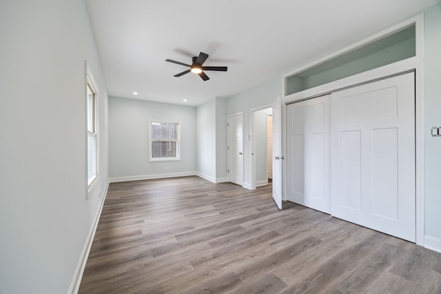 8623 S Prairie Ave, Chicago, IL 60619 - unfurnished bedroom featuring wood finished floors, recessed lighting, ceiling fan, and a closet