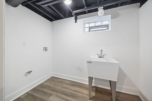 8623 S Prairie Ave, Chicago, IL 60619 - washroom featuring wood finished floors and washer hookup