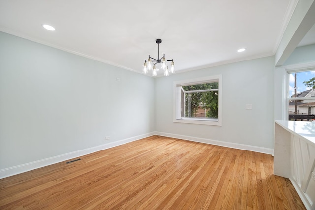 8623 S Prairie Ave, Chicago, IL 60619 - spare room with a chandelier, ornamental molding, light wood finished floors, and recessed lighting