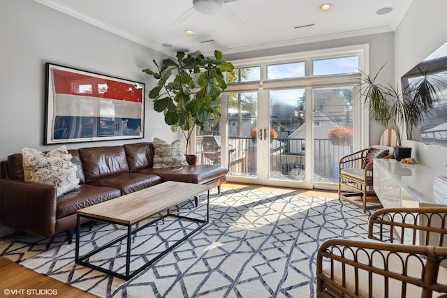 2107 W Belmont Ave Unit 2C, Chicago, IL 60618 - living room featuring wood finished floors, ornamental molding, ceiling fan, and french doors
