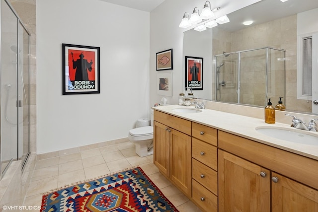 2107 W Belmont Ave Unit 2C, Chicago, IL 60618 - bathroom with double vanity, a stall shower, and tile patterned flooring