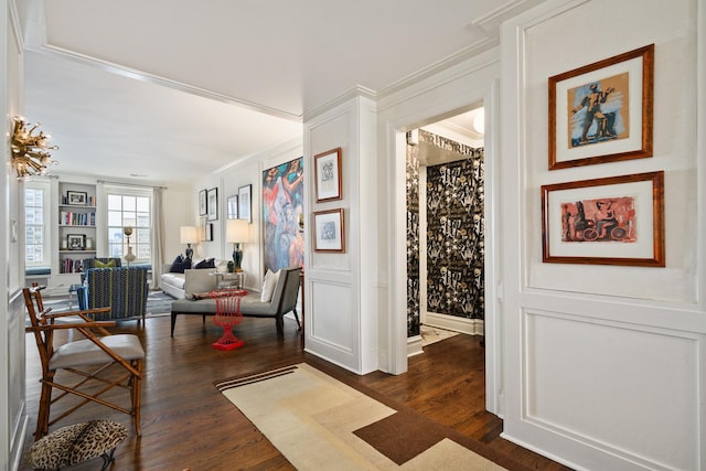3750 N Lake Shore Dr Unit 16H, Chicago, IL 60613 - sitting room featuring crown molding, dark wood finished floors, and a decorative wall