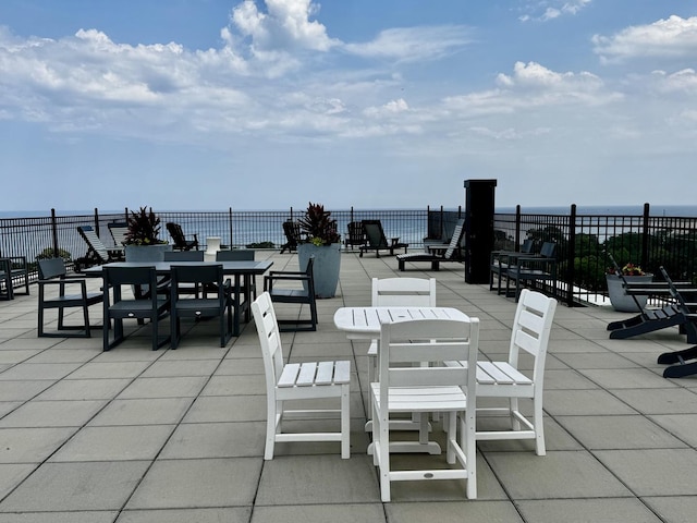 4960 N Marine Dr Unit 616, Chicago, IL 60640 - view of patio with outdoor dining area and a water view