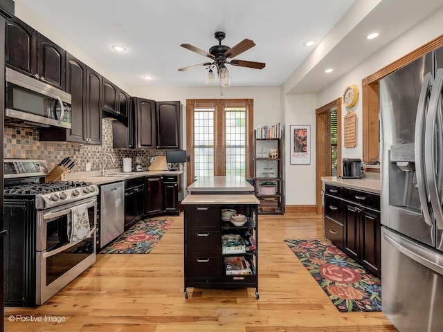 442 Du Page St, Elgin, IL 60120 - kitchen with appliances with stainless steel finishes, a ceiling fan, light countertops, plenty of natural light, and recessed lighting