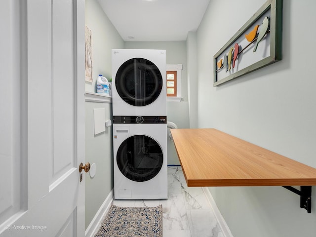 442 Du Page St, Elgin, IL 60120 - laundry room featuring stacked washing machine and dryer and marble finish floors
