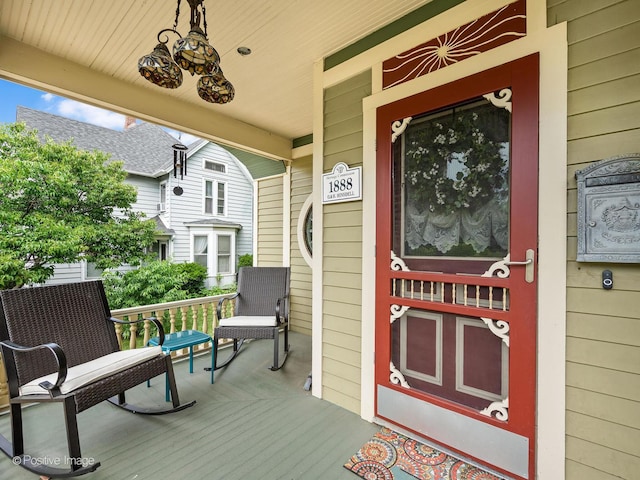 442 Du Page St, Elgin, IL 60120 - doorway to property featuring covered porch