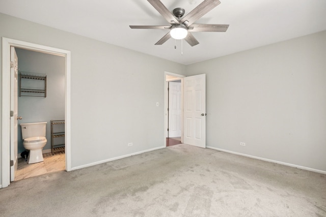 2125 Leeward Ln, Hanover Park, IL 60133 - unfurnished bedroom with carpet flooring, connected bathroom, and ceiling fan