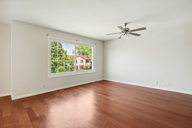 2125 Leeward Ln, Hanover Park, IL 60133 - unfurnished room featuring wood finished floors and ceiling fan
