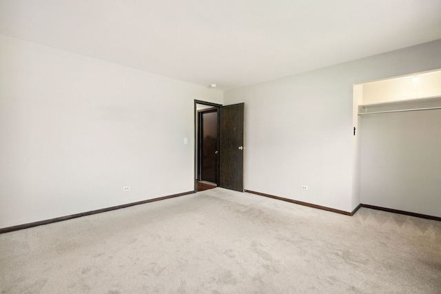 2125 Leeward Ln, Hanover Park, IL 60133 - unfurnished bedroom featuring carpet floors and baseboards