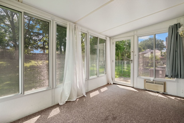 2125 Leeward Ln, Hanover Park, IL 60133 - unfurnished sunroom with plenty of natural light, carpet, and vaulted ceiling