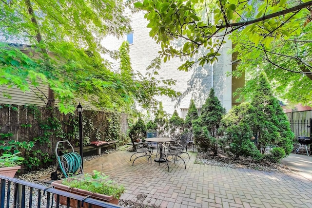 3117 N Orchard St Unit Ge, Chicago, IL 60657 - fenced backyard with a patio area and outdoor dining area