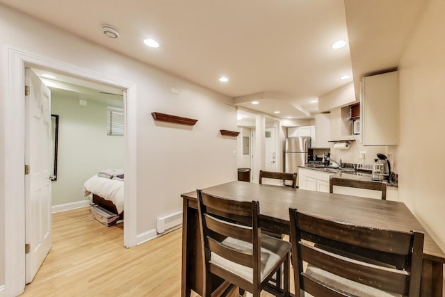 3117 N Orchard St Unit Ge, Chicago, IL 60657 - dining space with light wood-style floors and recessed lighting