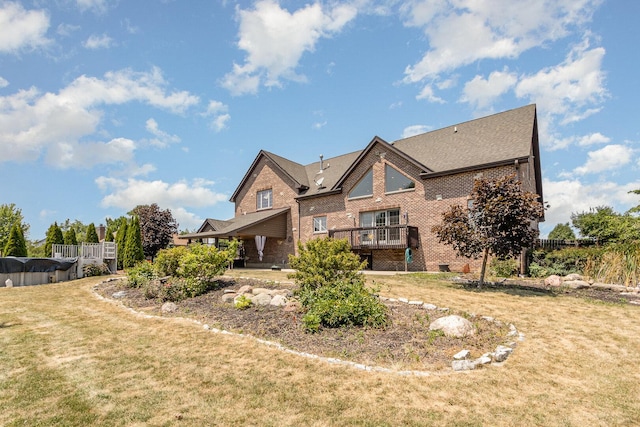 8741 W Blackthorne Way, Frankfort, IL 60423 - back of property featuring brick siding, a yard, and a shingled roof