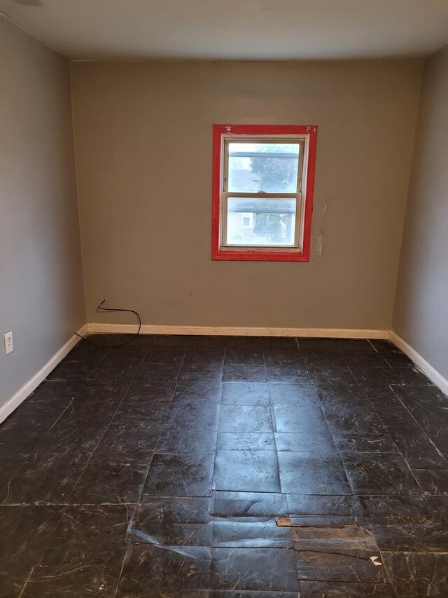 7655 S Clyde Ave, Chicago, IL 60649 - spare room with baseboards