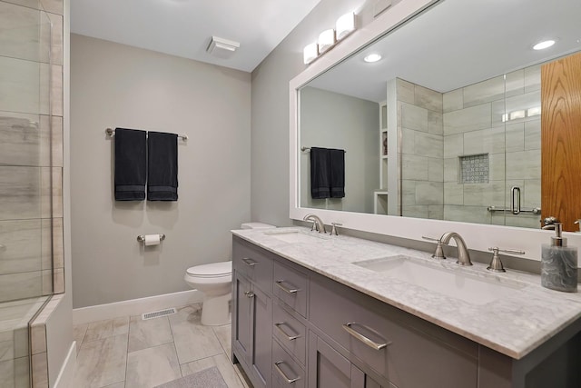 874 Dandridge Ct, Elgin, IL 60120 - bathroom with double vanity, a stall shower, and recessed lighting