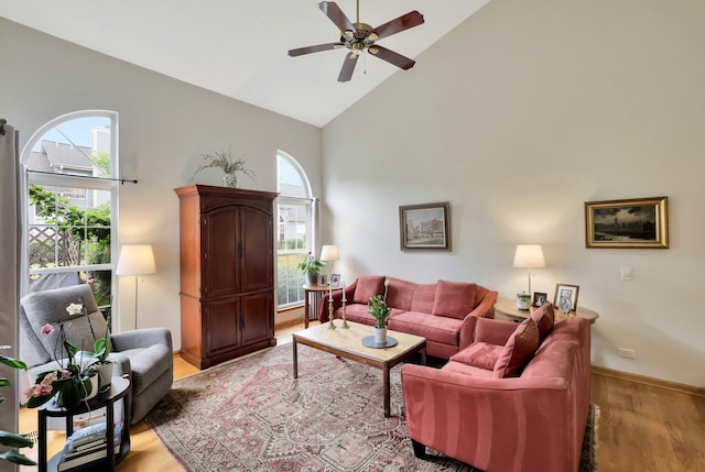 874 Dandridge Ct, Elgin, IL 60120 - living room with light wood finished floors, high vaulted ceiling, and a ceiling fan
