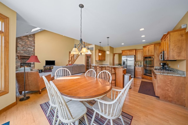 772 Wild Ginger Rd, Sugar Grove, IL 60554 - dining area with light wood finished floors, recessed lighting, a chandelier, and vaulted ceiling