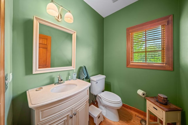 772 Wild Ginger Rd, Sugar Grove, IL 60554 - half bathroom featuring vanity and wood finished floors