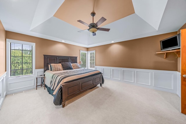 772 Wild Ginger Rd, Sugar Grove, IL 60554 - bedroom featuring a raised ceiling, a decorative wall, carpet, wainscoting, and multiple windows