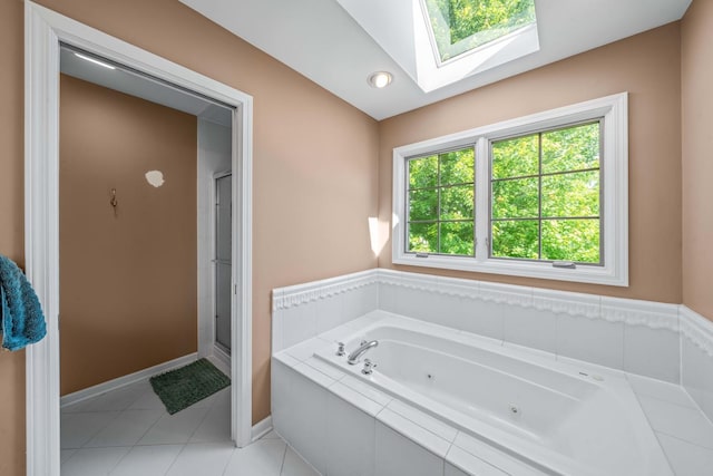 772 Wild Ginger Rd, Sugar Grove, IL 60554 - bathroom featuring a whirlpool tub, a skylight, a shower stall, and tile patterned flooring