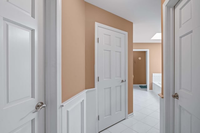 772 Wild Ginger Rd, Sugar Grove, IL 60554 - corridor featuring light tile patterned floors and wainscoting