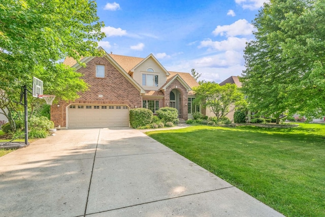 772 Wild Ginger Rd, Sugar Grove, IL 60554 - traditional-style house with brick siding, concrete driveway, a front yard, and a garage