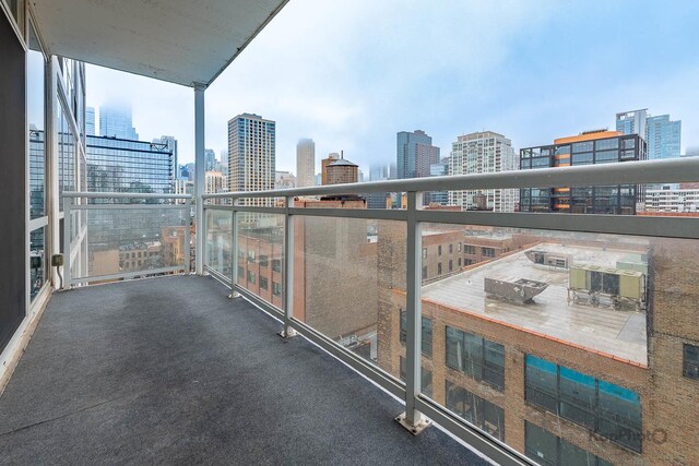 757 N Orleans St Unit 1104, Chicago, IL 60654 - balcony with a skyline view