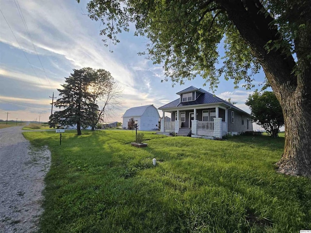 1749 N 1950th, Coatsburg, IL 62325 - bungalow featuring a porch, a front lawn, and a metal roof