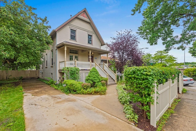 4317 N Kenneth Ave, Chicago, IL 60641 - victorian-style house with covered porch and stairs
