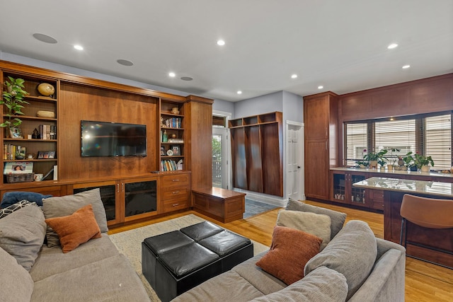 4317 N Kenneth Ave, Chicago, IL 60641 - living area with light wood-type flooring, recessed lighting, and healthy amount of natural light