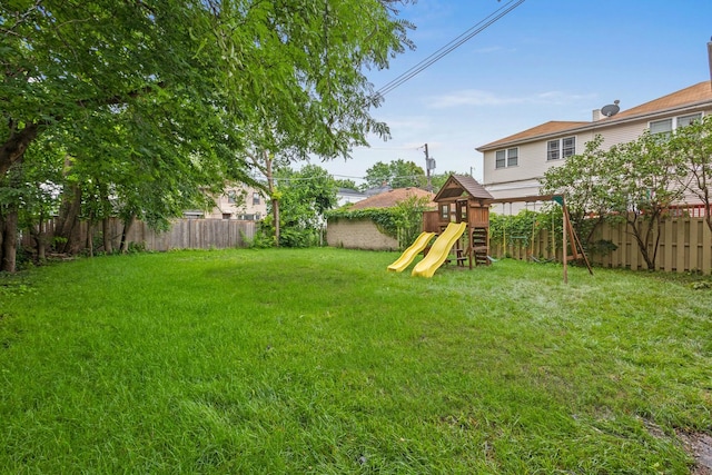 4317 N Kenneth Ave, Chicago, IL 60641 - fenced backyard with a playground