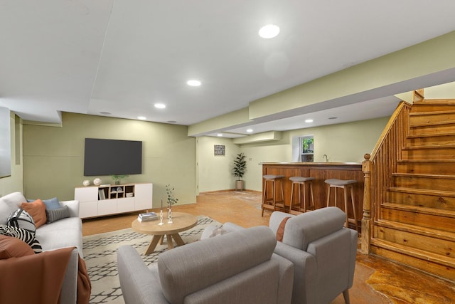 4317 N Kenneth Ave, Chicago, IL 60641 - living area with bar with sink, recessed lighting, and stairs