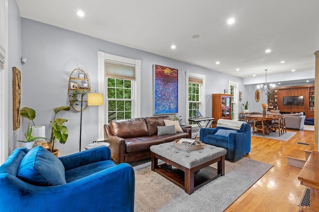 4317 N Kenneth Ave, Chicago, IL 60641 - living area with recessed lighting, a chandelier, and light wood-style flooring
