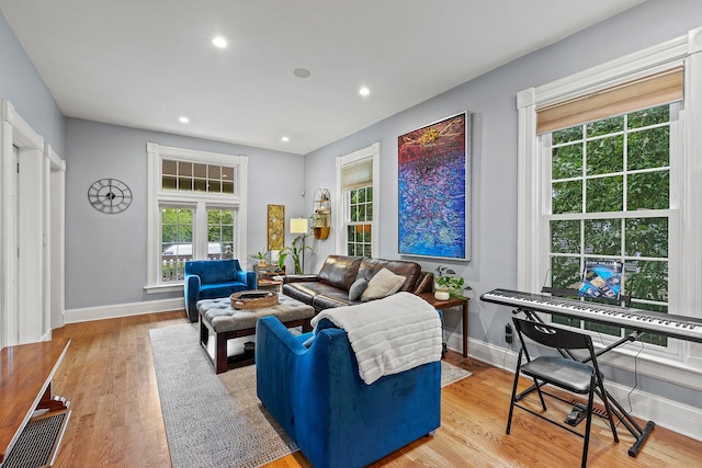 4317 N Kenneth Ave, Chicago, IL 60641 - living room featuring wood finished floors and recessed lighting